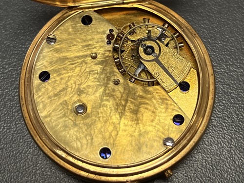Lot 253 - An 18ct gold cased open face pocket watch, the...