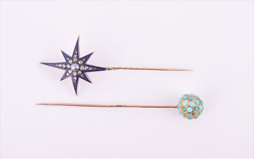 Lot 725 - A yellow metal and turquoise stick pin...