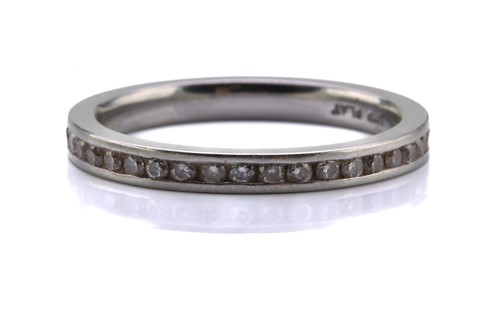 Lot 153 - A diamond eternity ring, comprises an array of...