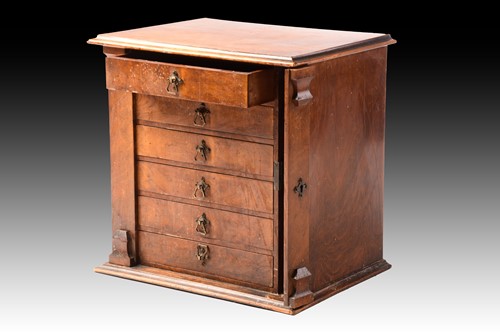 Lot 224 - A Victorian figured walnut six drawer...