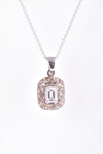 Lot 675 - An 18 carat white gold and diamond pendant the...