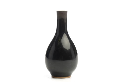Lot 146 - A small Chinese mirror black glazed vase, Qing,...