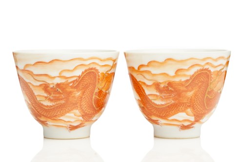 Lot 179 - A pair of Chinese porcelain iron red wine cups,...