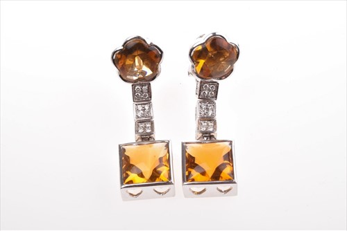 Lot 551 - A pair of diamond and citrine drop earrings...