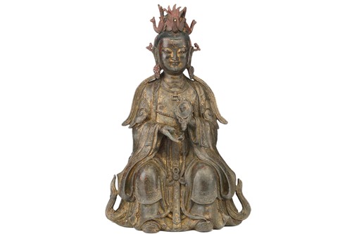 Lot 182 - A Chinese bronze figure of Guanyin, seated...