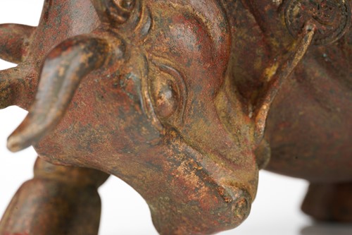 Lot 198 - A Chinese bronze figure of a charging bull,...