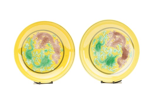 Lot 204 - A pair of Chinese porcelain dragon dishes,...