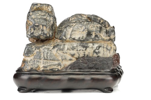Lot 175 - A Chinese scholars rock, of zoomorphic form in...