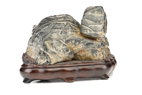 Lot 175 - A Chinese scholars rock, of zoomorphic form in...