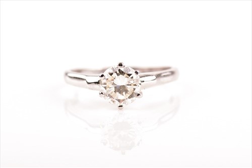 Lot 554 - A diamond solitaire ring the round...