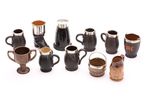 Lot 106 - Eight Doulton ‘Leather ware’ miniatures, and...