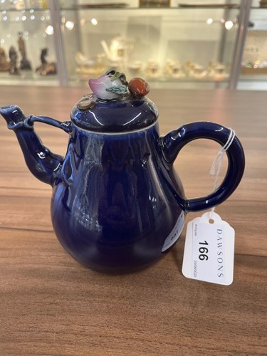 Lot 166 - A Chinese porcelain blue glazed teapot, of...