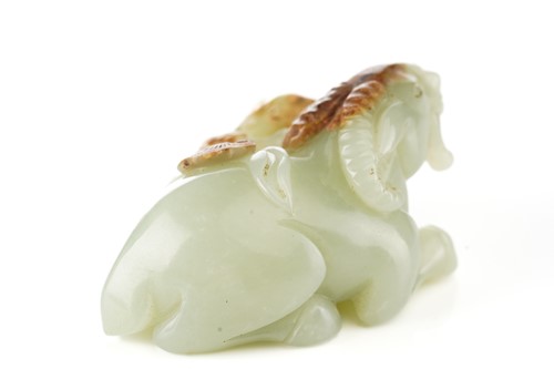 Lot 201 - A Chinese jade figure of a ram and its young,...