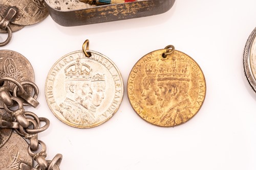 Lot 319 - A collection of 9 pocket watches, some medals,...