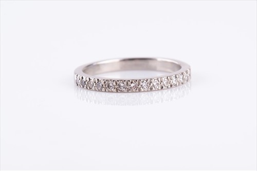 Lot 637 - Tiffany & Co: A platinum and diamond half...