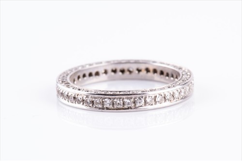 Lot 638 - A diamond eternity ring signed "Arigio" pave...