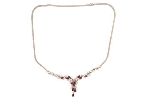 Lot 88 - A ruby and diamond necklace, claw set with...