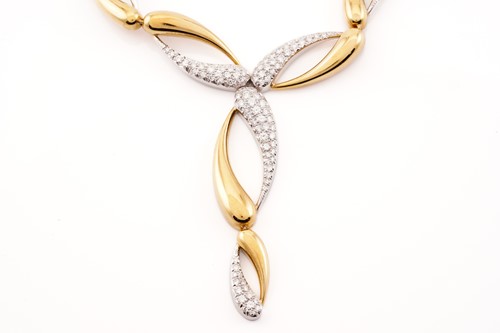 Lot 210 - A diamond set two-tone necklace, with...