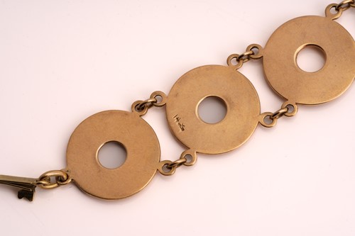 Lot 91 - A necklace with annular discs and a matching...