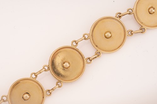 Lot 16 - A disc link bracelet set with jade and diamond,...