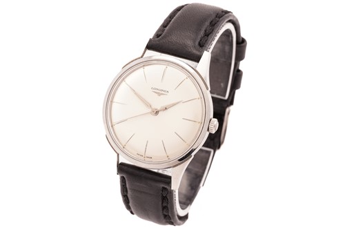 Lot 320 - A Longines hand-wound wristwatch, featuring a...
