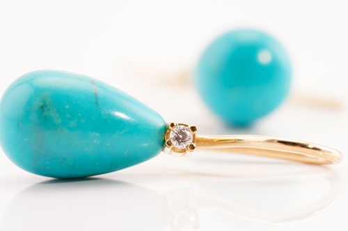 Lot 190 - An imitation turquoise pendant on chain,...