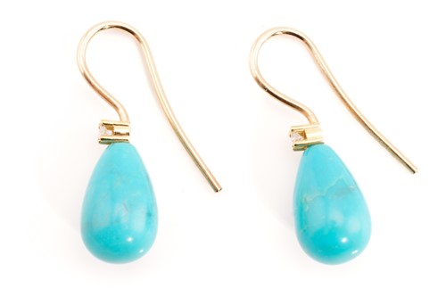 Lot 190 - An imitation turquoise pendant on chain,...