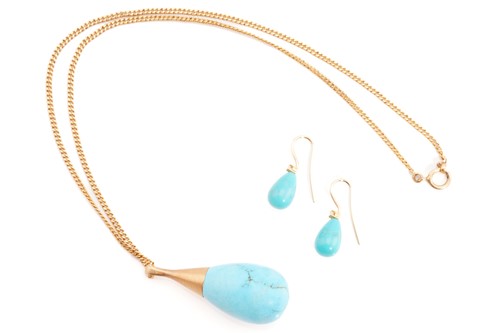 Lot 190 - An imitation turquoise pendant on chain,...