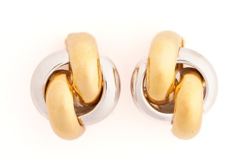 Lot 132 - A pair of two-tone clip-on earrings, possibly...