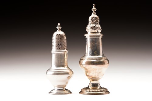 Lot 452 - Two Georgian silver casters, the smallest...