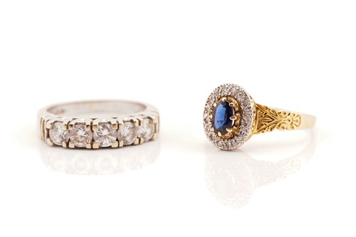 Lot 270 - Two gem-set 18ct gold rings; The first...