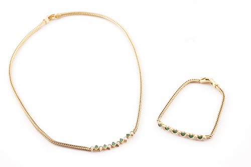 Lot 146 - Mappin & Webb - A diamond and emerald necklace...