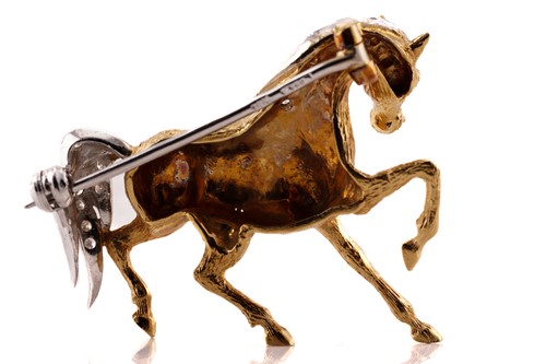 Lot 51 - Mappin & Webb - An 18ct gold horse brooch set...