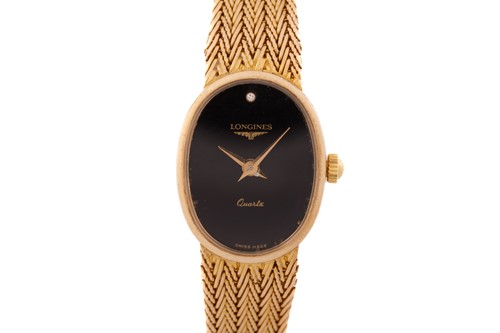 Lot 380 - A lady's Longines dress watch, featuring a...