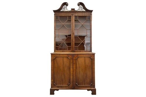Lot 308 - A George III mahogany cupboard bookcase with a...