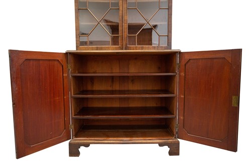 Lot 308 - A George III mahogany cupboard bookcase with a...