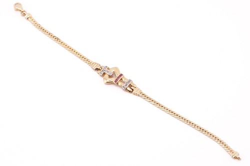 Lot 202 - A buckle bracelet set with diamonds and rubies,...