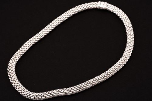 Lot 17 - FOPE - A Flex'It necklace and a bracelet; The...