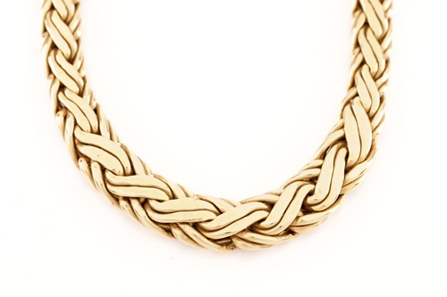 Lot 30 - Tiffany & Co. - A graduated wheat necklace in...