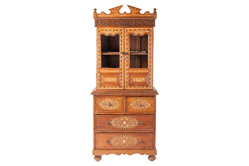 Lot 300 - An Anglo-Indian bone and ebony inlaid cabinet,...