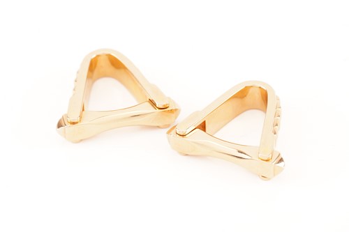 Lot 79 - A pair of stirrup cufflinks in 18ct pink gold...