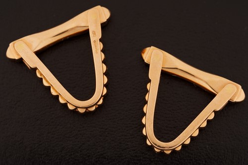 Lot 79 - A pair of stirrup cufflinks in 18ct pink gold...