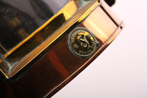 Lot 369 - A brass ship's compass by Sestral, the domed...