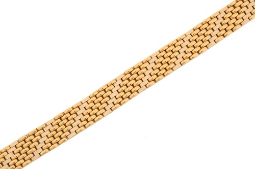 Lot 75 - A seven-row brick link chain in 18ct gold, two-...