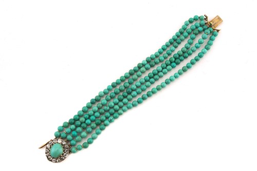Lot 181 - A five-row turquoise bracelet with a...