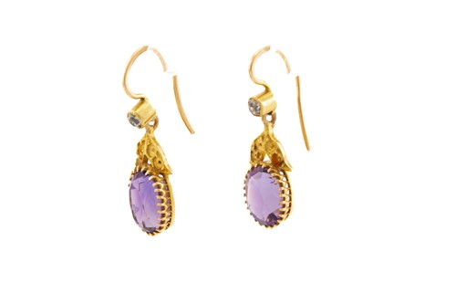Lot 136 - A pair of amethyst and diamond earrings, each...