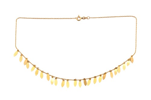 Lot 142 - A foliate fringe necklace, of leaf motif...