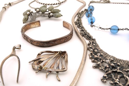 Lot 147 - A collection of white metal jewellery,...