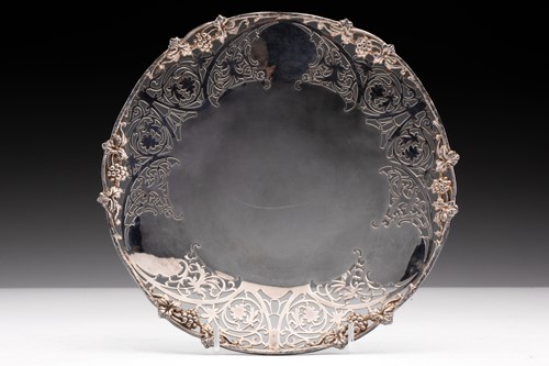 Lot 452 - A fruit plate, the cast rim with fruiting...
