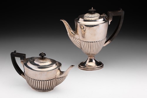 Lot 426 - An early silver coffee pot and a silver teapot...